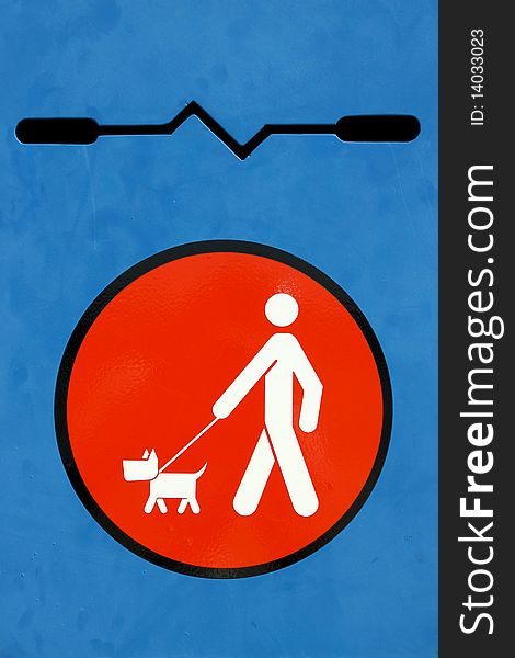 Modern metallic sign, painted, regarding dog walks. Modern metallic sign, painted, regarding dog walks