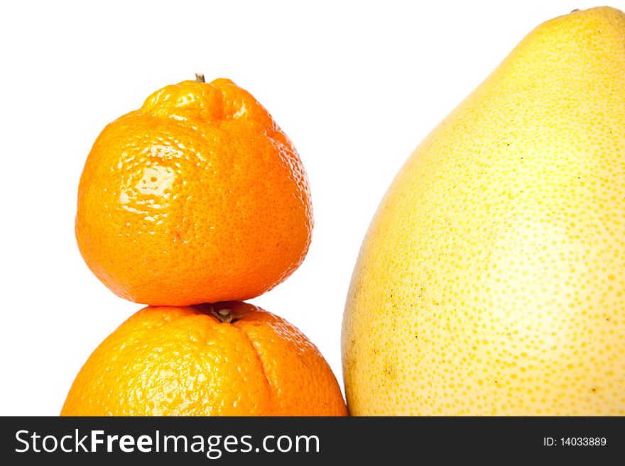 Citrus fruits on a white.