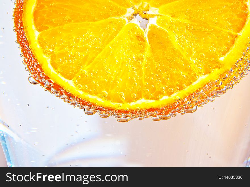 Sliced orange fruits in cocktail glass in detail. Sliced orange fruits in cocktail glass in detail