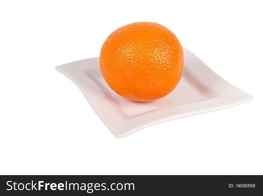 Fresh Orange on a white plate on white Background