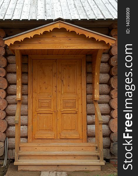 Front door of rural log wood house. Front door of rural log wood house