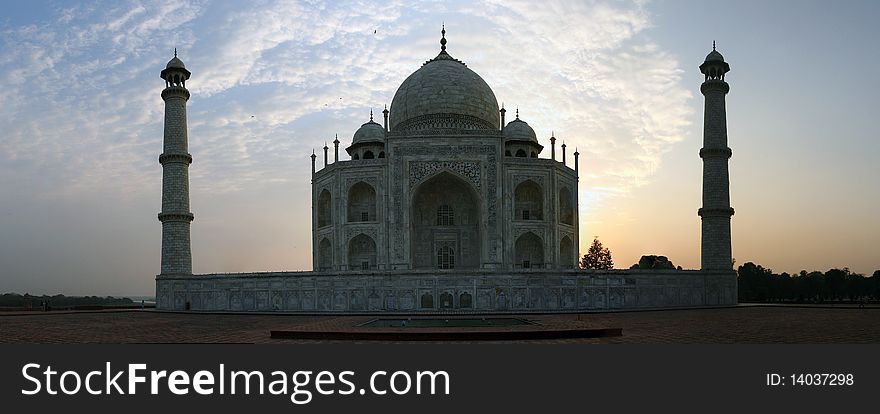View on the Taj Mahal from the Western side at sunrise