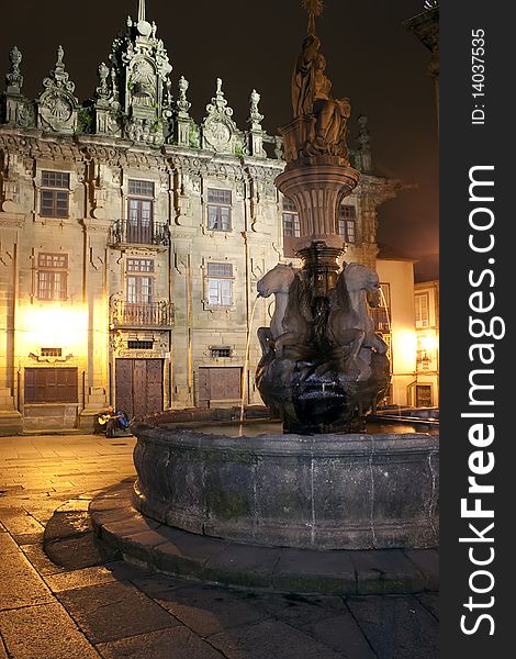 Song writer and guitarrist near Santiago cathedral. Quintana Square. Photo shot at night. Song writer and guitarrist near Santiago cathedral. Quintana Square. Photo shot at night