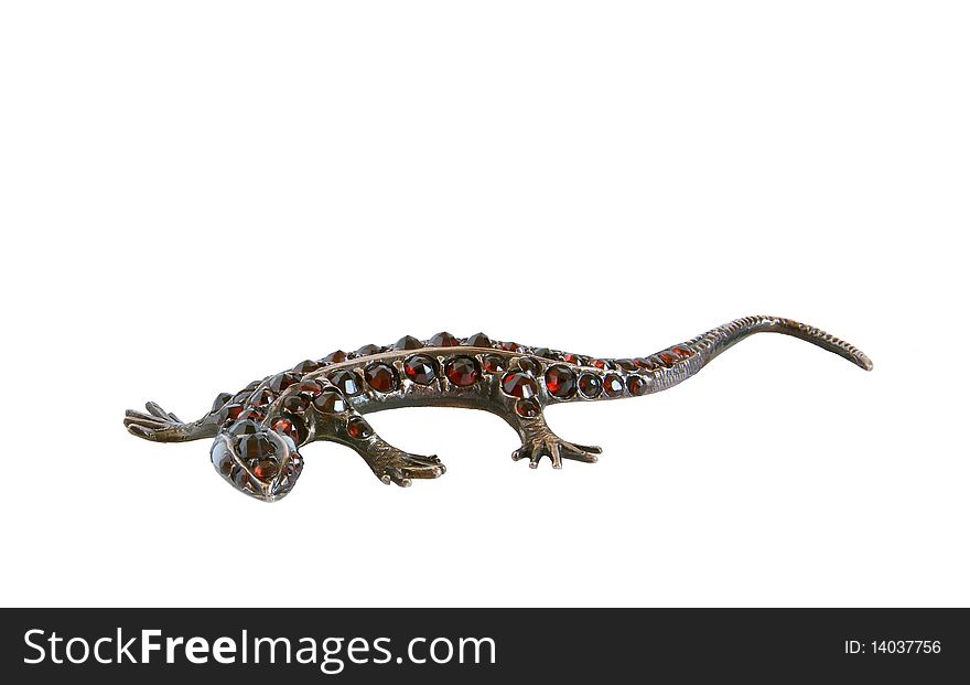 Jewelery - lizard figurine made of metal with natural grenades, isolation