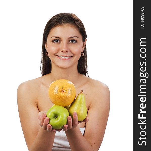 Pretty young girl with fruit in her hands on white background. Pretty young girl with fruit in her hands on white background