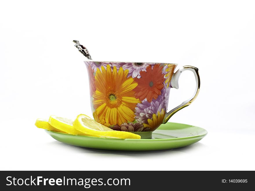 Tea with mint and lemon on a white background