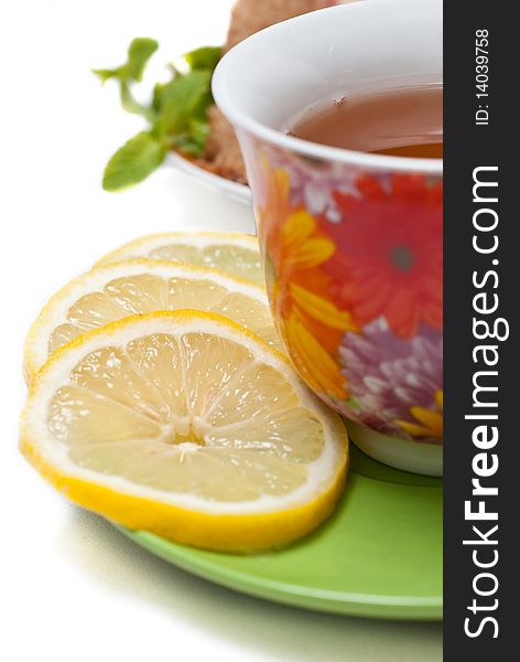 Cake with tea, lemon