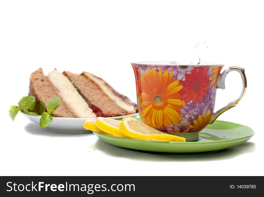 Cake with tea, lemon