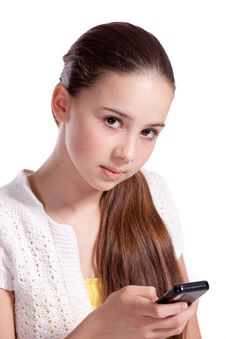 Girl Talks By Mobile Phone Royalty Free Stock Images