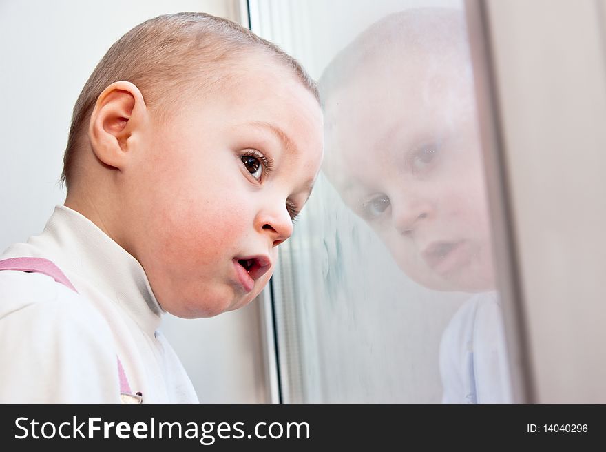 Young Baby Boy And Mirror