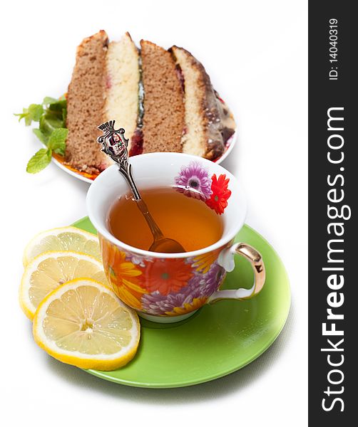 Cake with tea, lemon