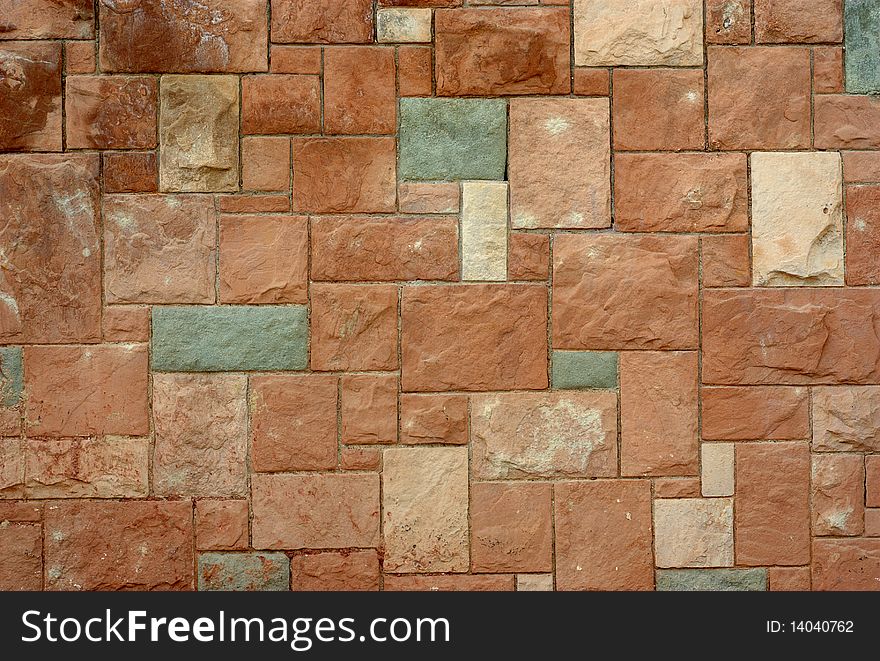 Stone wall in various shades and stains