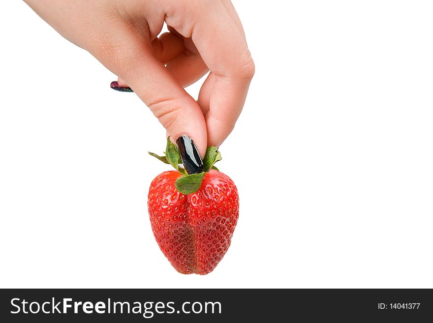 Strawberry In A Female Hand