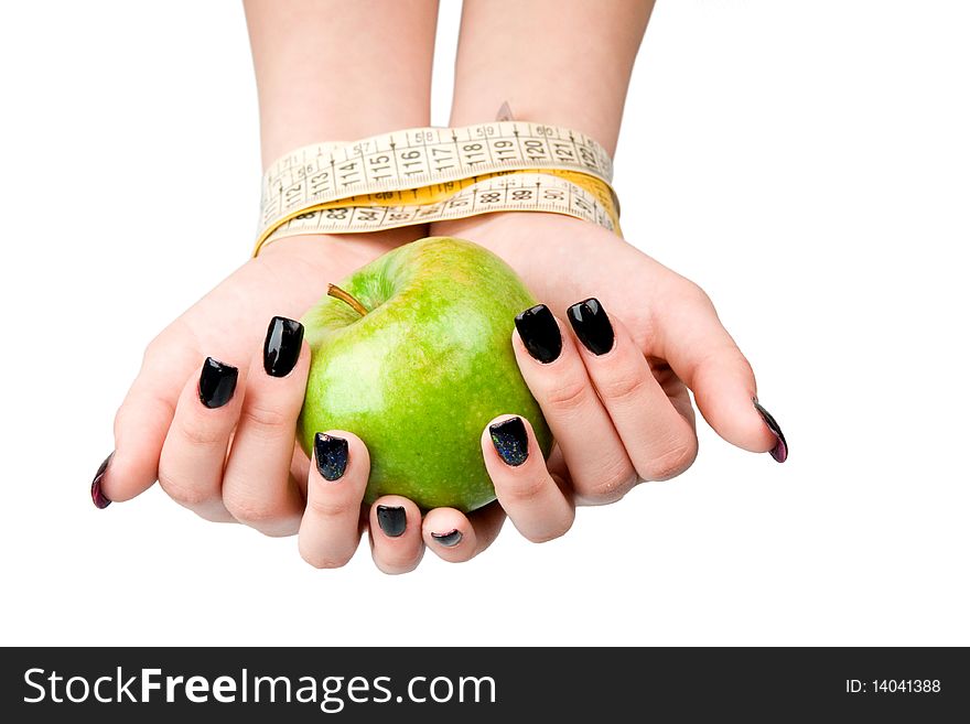 Apple in the female connected hands. A diet symbol.