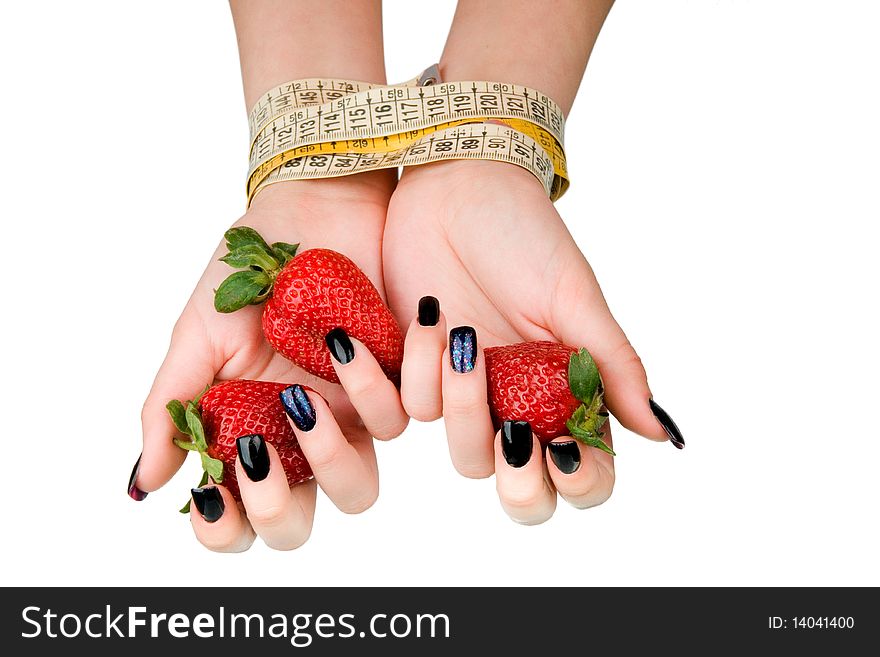 Strawberry in the female connected hands. A diet symbol. Strawberry in the female connected hands. A diet symbol.