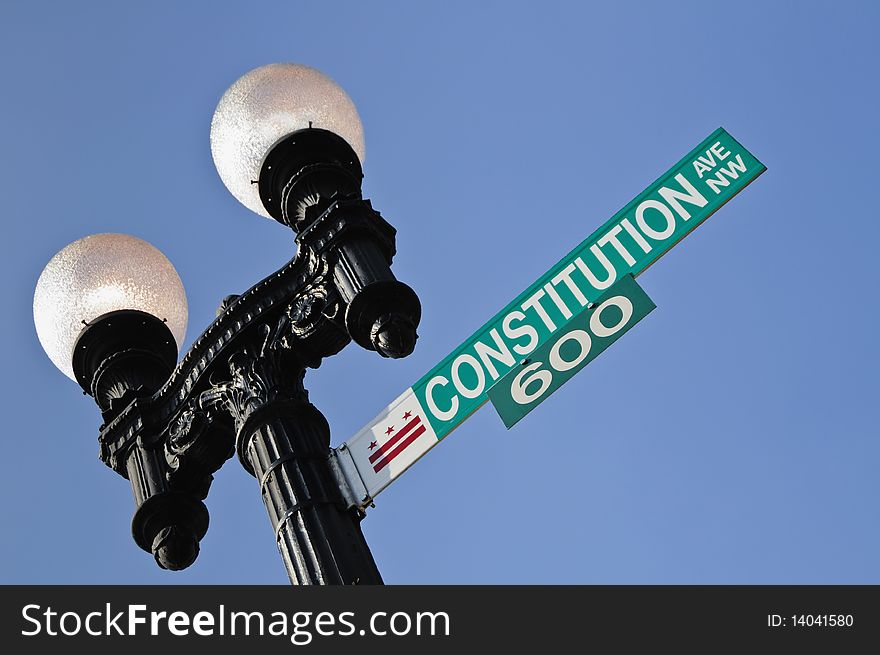 Constitution Avenue Sign in Washington DC against blue sky