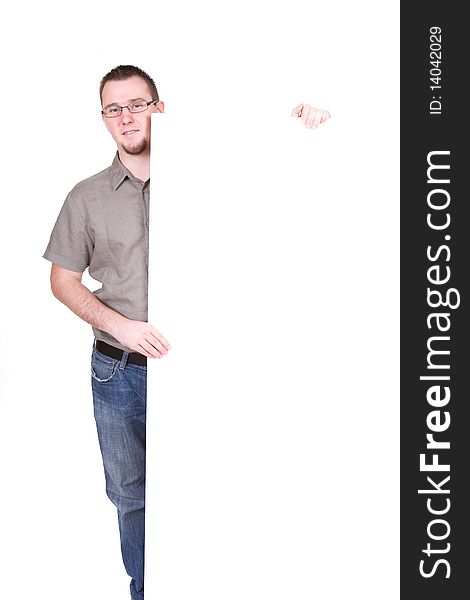 Casual man holding banner over white background. Casual man holding banner over white background