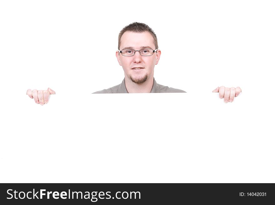 Casual man holding banner over white background. Casual man holding banner over white background