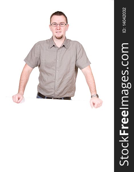 Casual man holding banner over white background. Casual man holding banner over white background