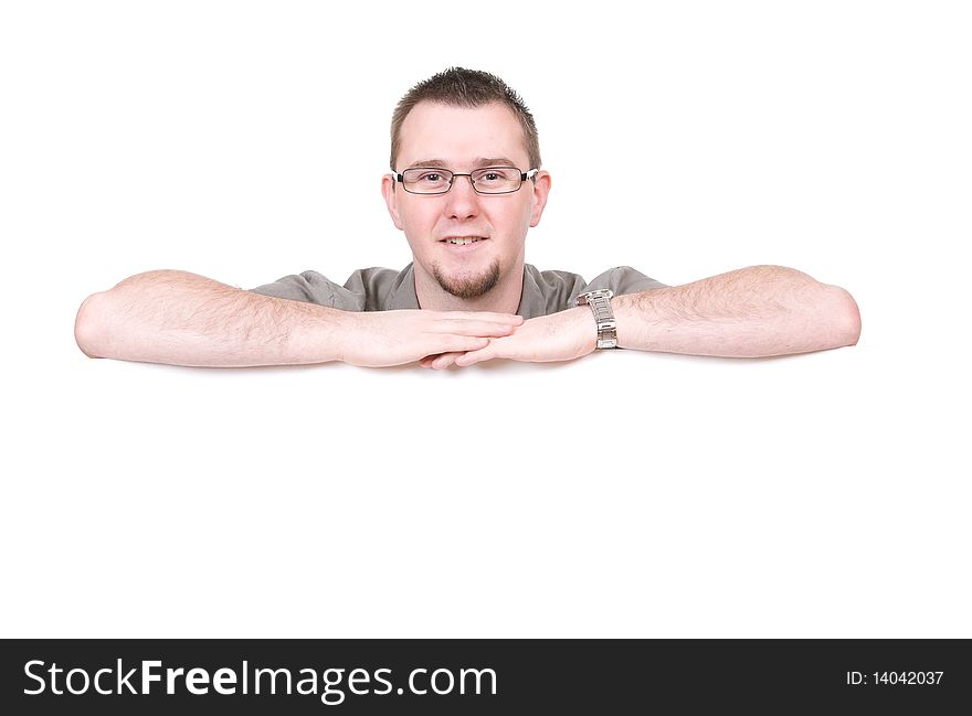 Casual man holding banner over white background. Casual man holding banner over white background