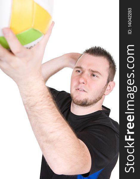 Young happy man with ball. over white background. Young happy man with ball. over white background