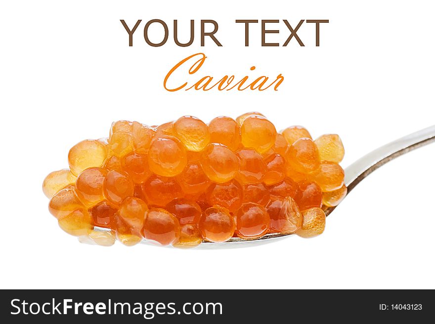 Teaspoon red caviar isolated over white