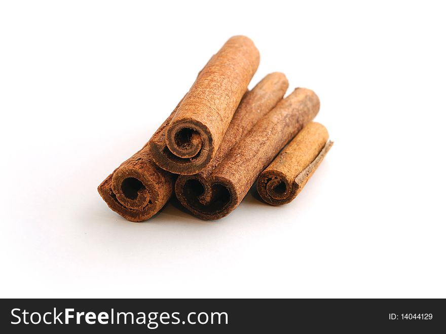 Delicious looking cinnamon sticks isolated on a white background. Delicious looking cinnamon sticks isolated on a white background