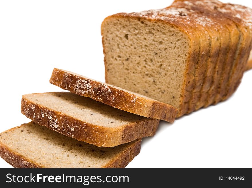 Sliced, delicious, fresh bread on white background. Sliced, delicious, fresh bread on white background