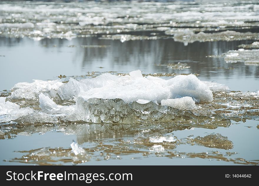Snow and ice drift on surface of the river