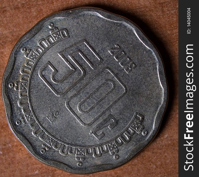 Close up of a Russian coin on a brown background