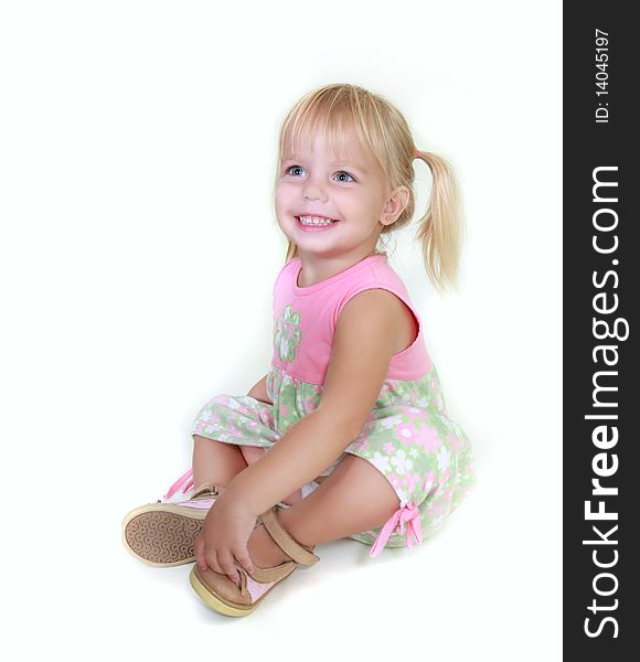 Cute toddler girl over white