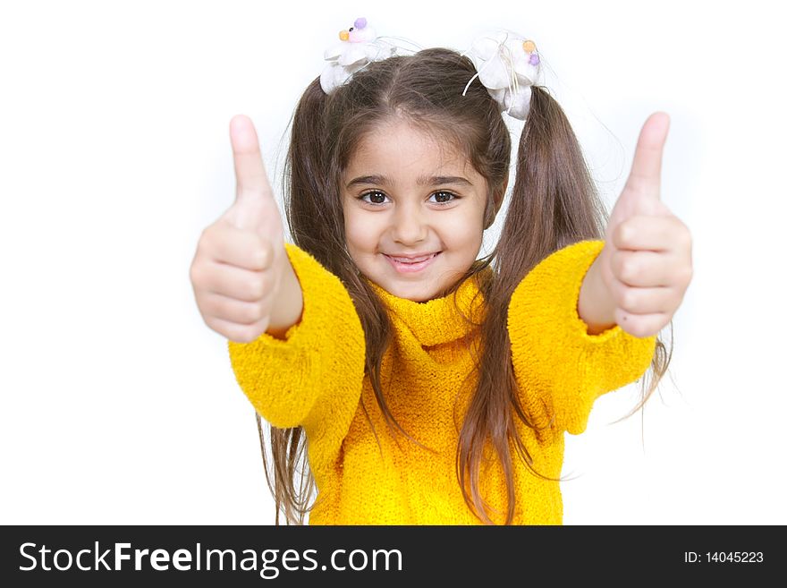 Young girl showing her thumbs up over white