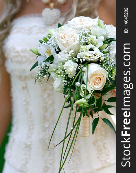 Close up of wedding bouquet in bride's hands