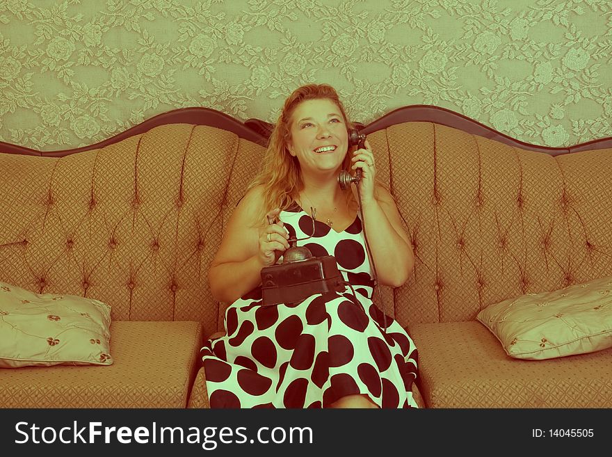 Vintage type image with smiling Caucasian woman on phone. Vintage type image with smiling Caucasian woman on phone.