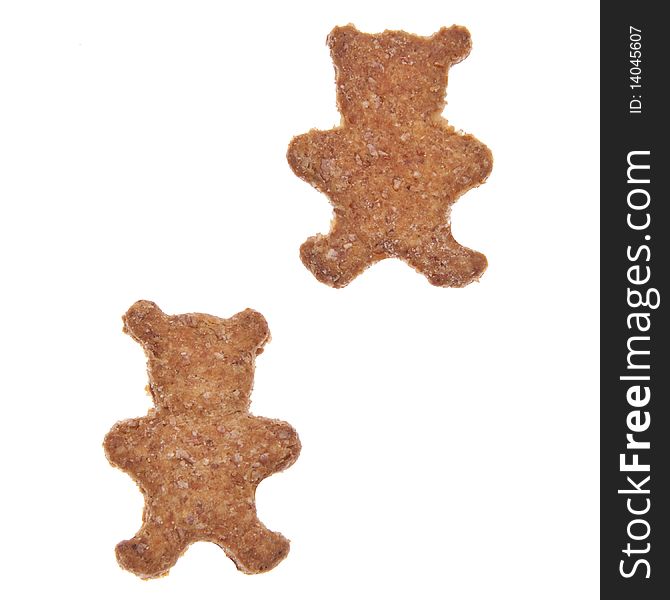 Bear shaped cookies or pet treats for your cat or dog. Isolated on white with a clipping path.