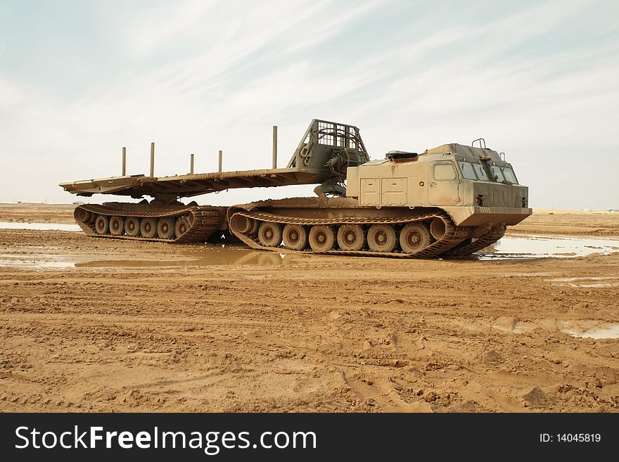 A powerful army truck all-terrain vehicle. Close-up. Day. A powerful army truck all-terrain vehicle. Close-up. Day.