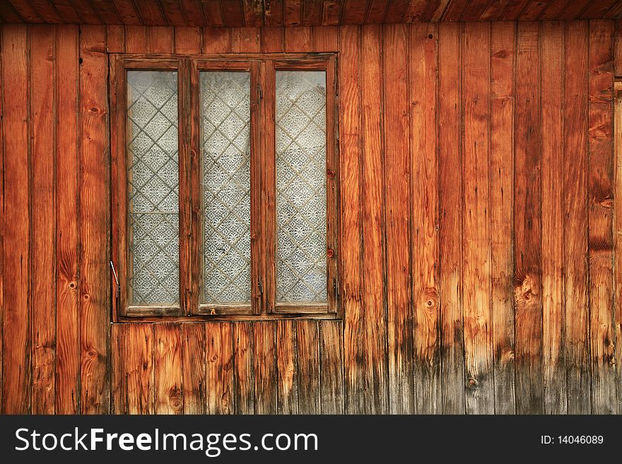 Old romanian wooden window with wall texture. Old romanian wooden window with wall texture
