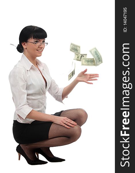 Businesswoman tossing up some dollars. Businesswoman tossing up some dollars