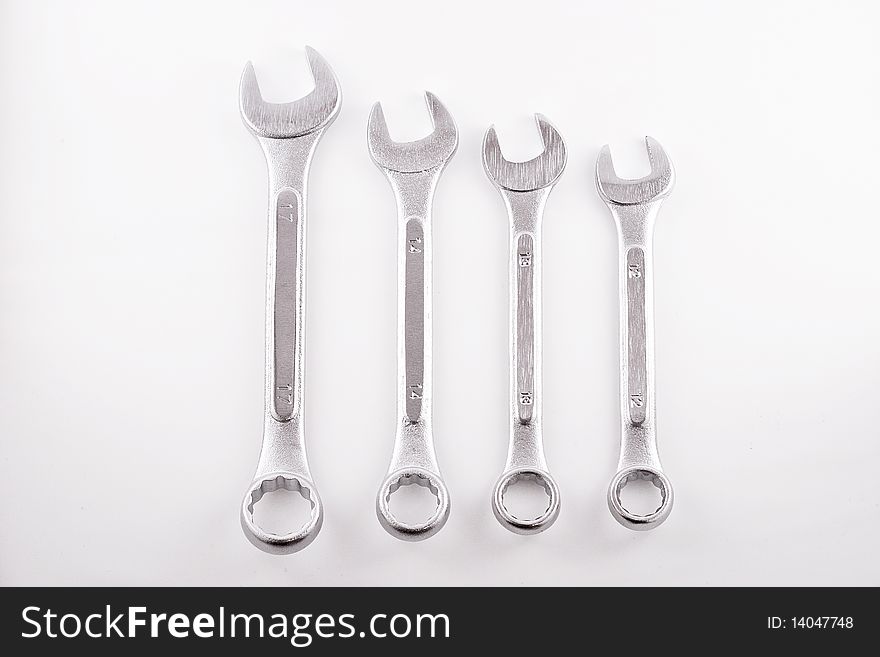 Combination wrenches on an isolated white background. Combination wrenches on an isolated white background.