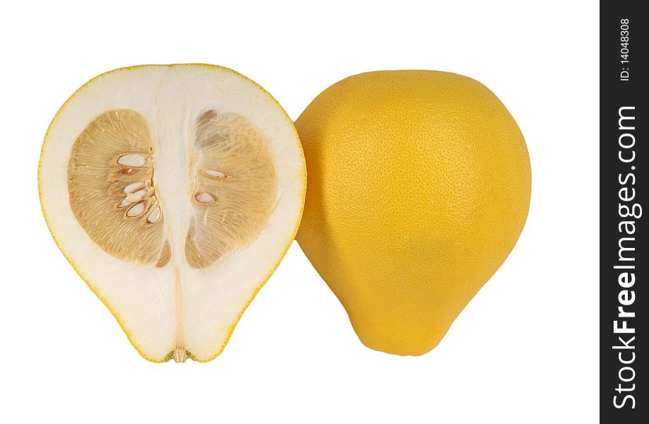 Two halves of fruit pomelo lie nearby isolated in white