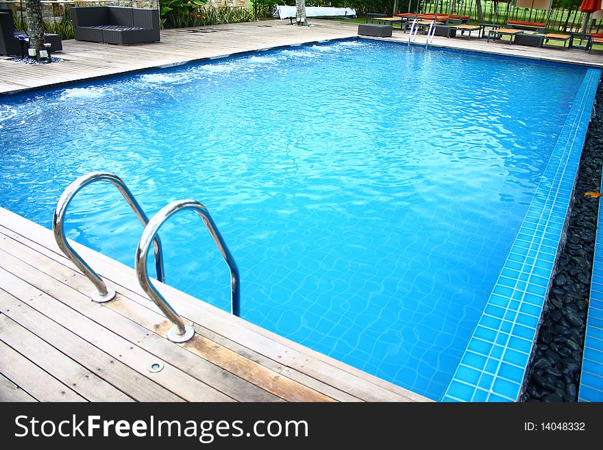 Luxury hotel poolside and ladder