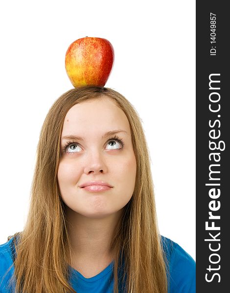 Portrait of thoughtful woman with apple on her head, over white. Portrait of thoughtful woman with apple on her head, over white