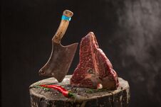 Raw Fresh Marbled Meat Beef Ax On A Black Background Stock Image
