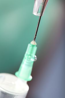 Doctor Holding Syringe Royalty Free Stock Photography Doctor Holding Syringe Royalty Free Stock Photography