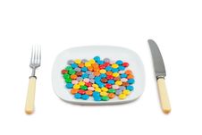 Knife, Plug And Plate With  Lot Of Multi-coloured Stock Images