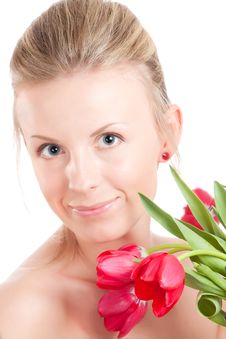 Young Woman With Bunch Of Tulips Royalty Free Stock Photography