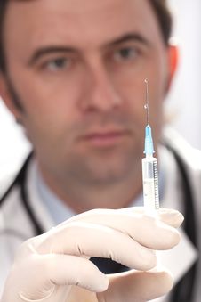 Doctor With Medical Syringe In Hands Stock Photo Doctor With Medical Syringe In Hands Stock Photo
