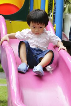 Cute Asian Boy In A Playground Stock Photography
