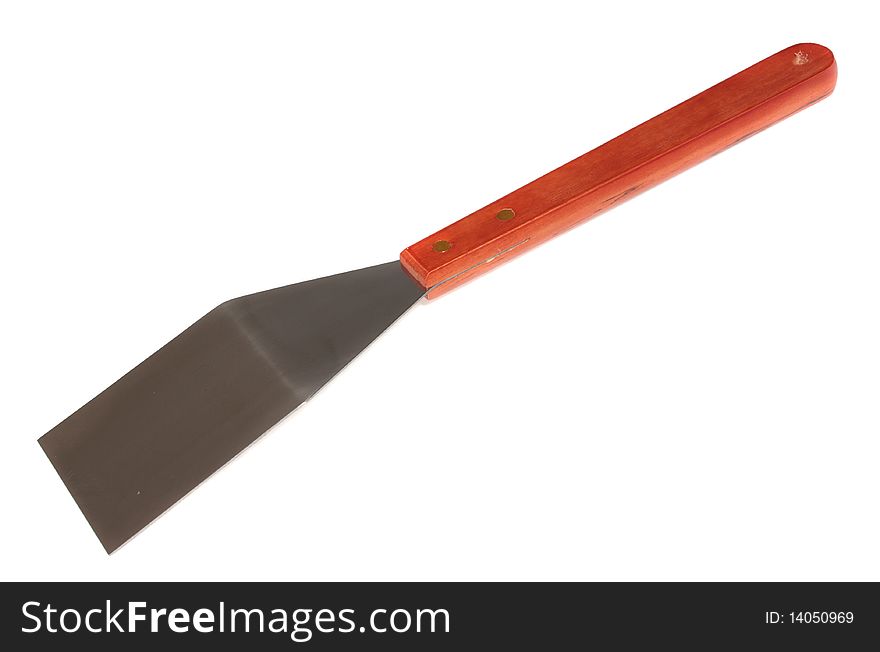 Shovel for a grill, on a white background, it is isolated. Shovel for a grill, on a white background, it is isolated.