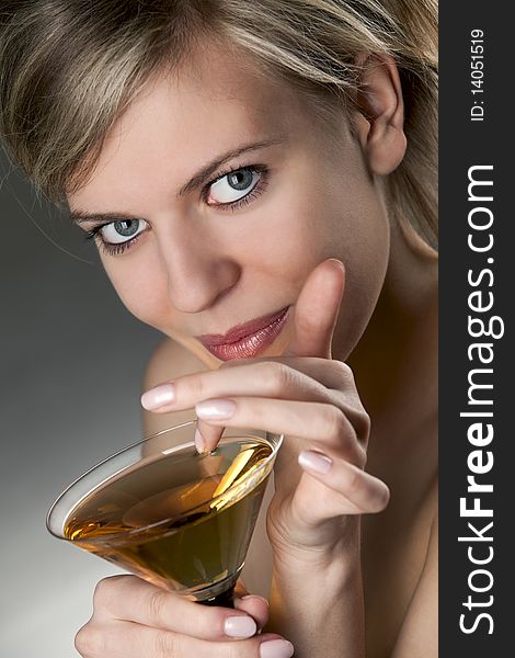 Woman with glass of cocktail